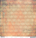 Clay Pattern 12x12 cardstock by BasicGrey Motifica collection, featuring a repeating ornate medallion and fleur-de-lis pattern in cream white on a warm coral peach terracotta distressed background with teal sage green on the left edge