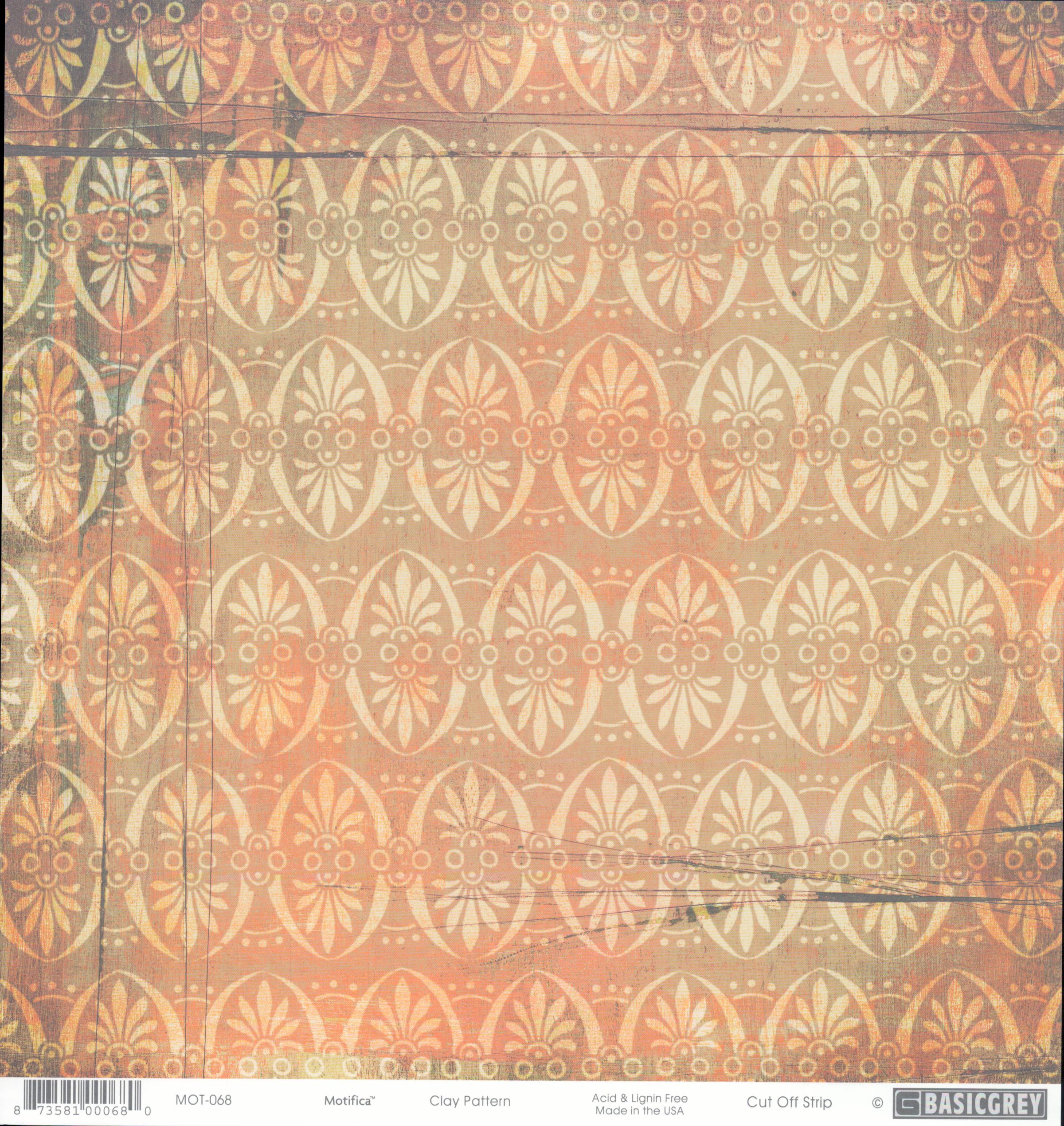 Clay Pattern 12x12 cardstock by BasicGrey Motifica collection, featuring a repeating ornate medallion and fleur-de-lis pattern in cream white on a warm coral peach terracotta distressed background with teal sage green on the left edge