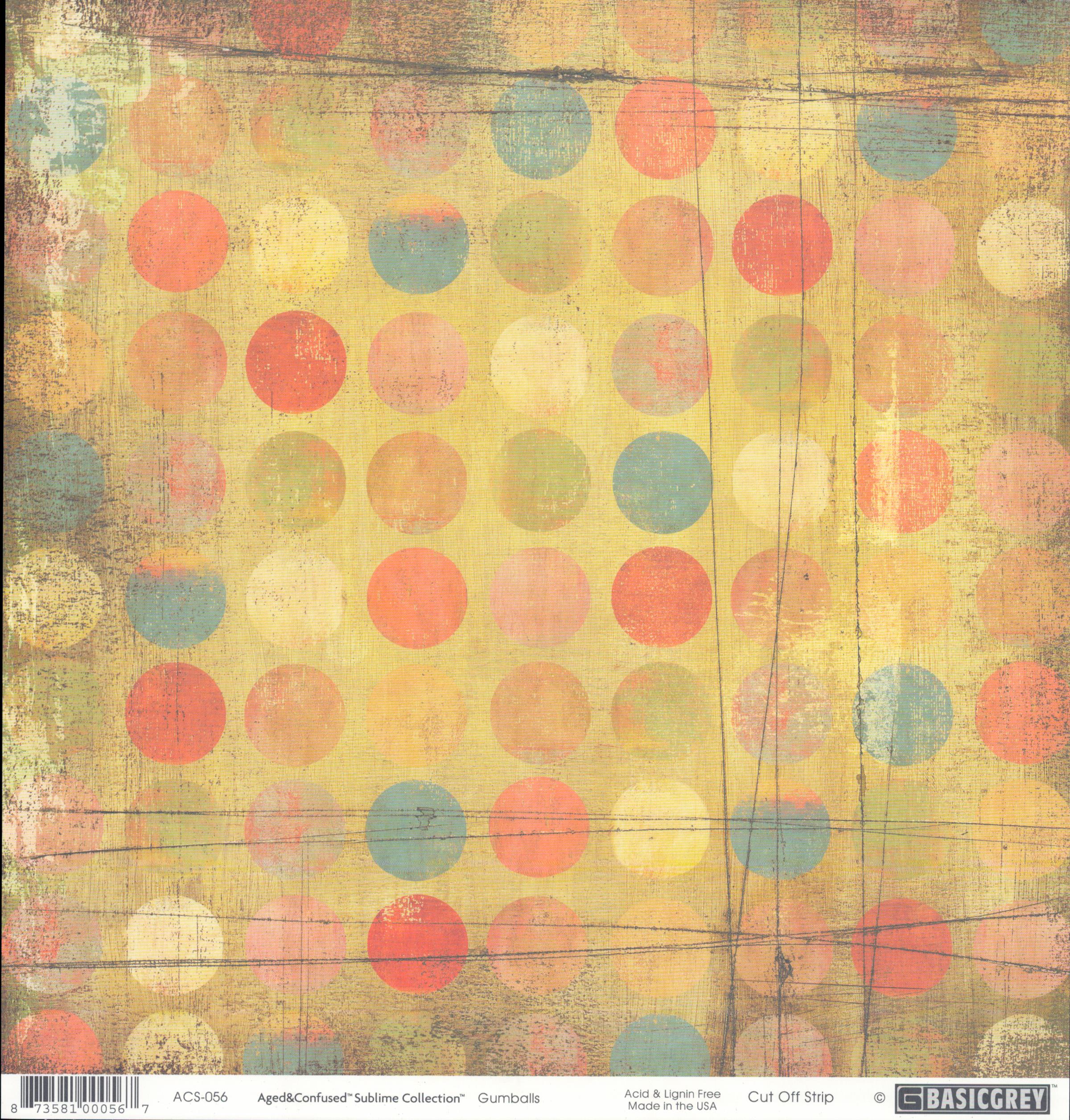 Gumballs 12x12 cardstock by BasicGrey Aged and Confused Sublime Collection, featuring large overlapping polka dots in coral red pink peach teal blue and cream on a warm golden yellow distressed background with hand-drawn grey grid lines