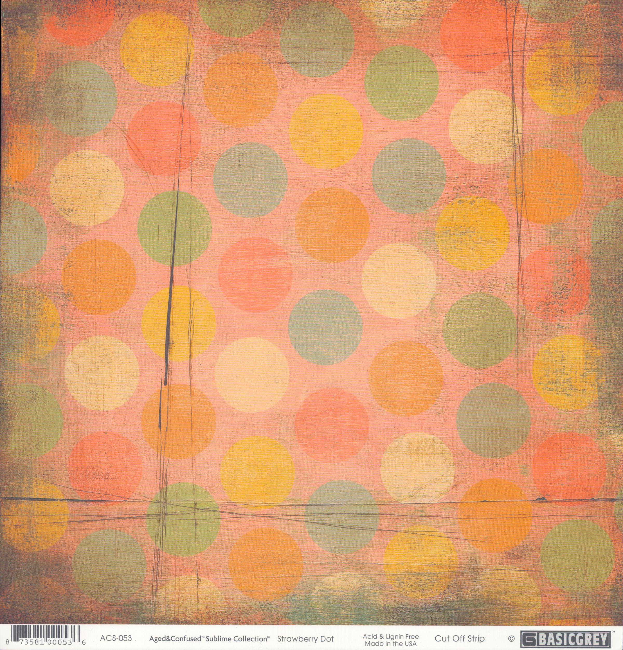 Strawberry Dot 12x12 cardstock by BasicGrey Aged and Confused Sublime Collection, featuring large polka dots in coral orange yellow gold sage green and cream on a warm pink peach distressed background