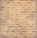 The Paper Studio Eyeglasses 12x12 scrapbook paper with rows of vintage eyeglass frames in cat-eye, round and browline styles in brown on golden tan chevron background