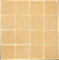 Sweetwater S10 12x12 scrapbook paper with warm golden tan tile grid pattern and rustic frayed edge texture