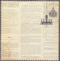 The Paper Studio Vintage French Newspaper with Chandelier 12x12 scrapbook paper with dense French encyclopedia text and dramatic black chandelier silhouette on aged parchment