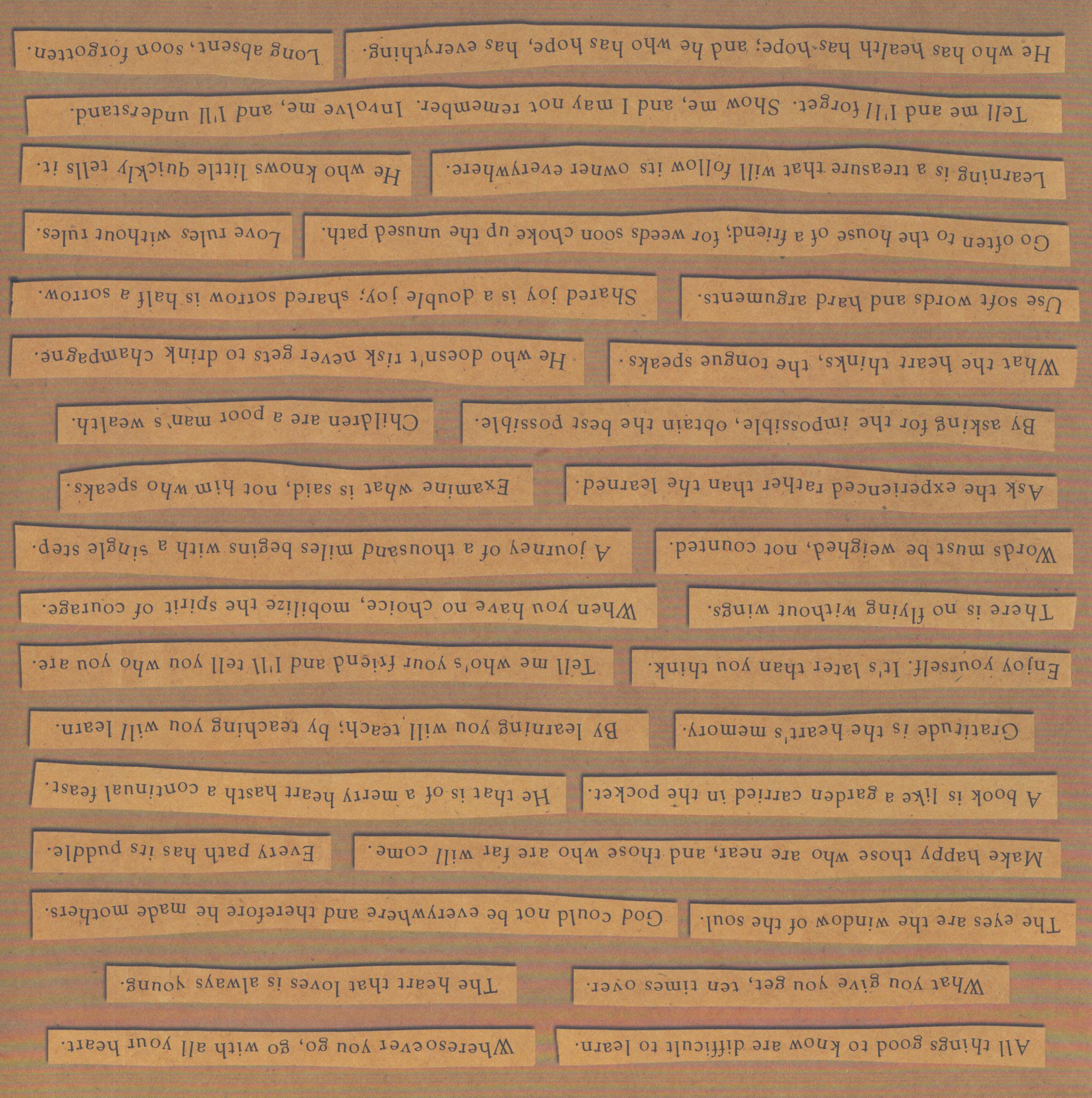 K&Company LJ Quotes & Sayings 12x12 scrapbook paper with rows of inspirational international proverbs in italic script on kraft paper strips against golden brown background
